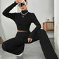 BROCELLES Stand Collar Navel T-shirt and Trumpet pants Brocelles.